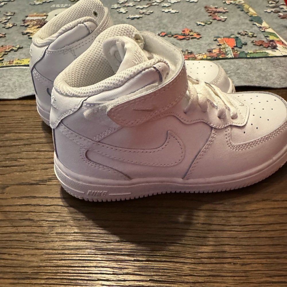 White toddler Nike shoes